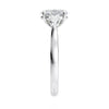 Lab grown diamond oval 3 stone with pear cut sides white gold end view.