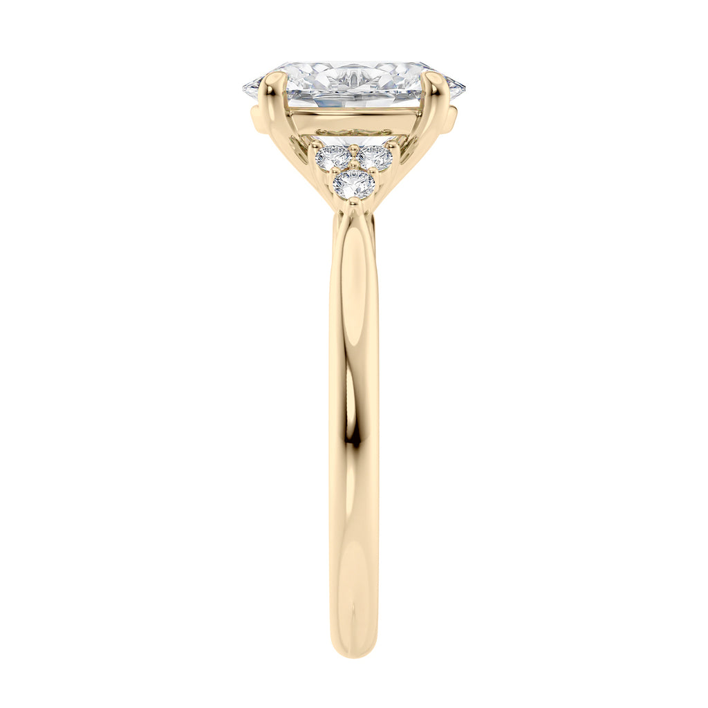 Lab grown oval diamond engagement ring with trilogy diamond set shoulders 18ct gold end view.