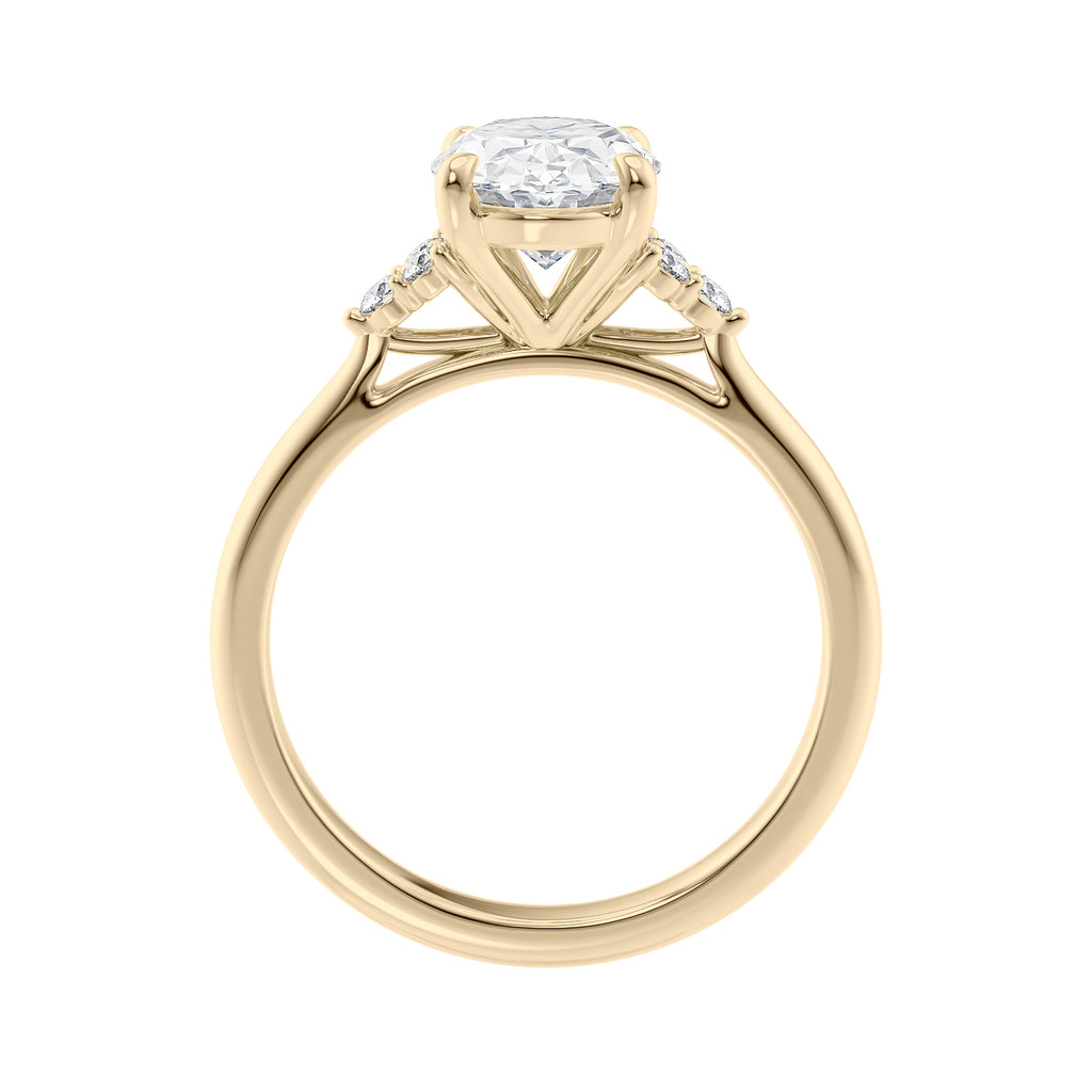 Lab grown oval diamond engagement ring with trilogy diamond set shoulders 18ct gold side view.