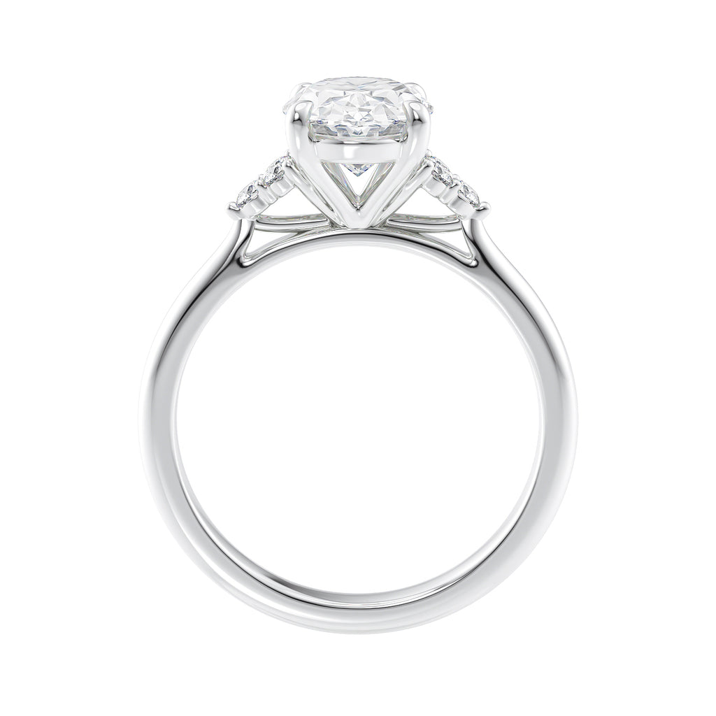 Lab grown oval diamond engagement ring with trilogy diamond set shoulders 18ct white gold side view.