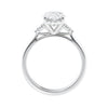 Lab grown oval diamond engagement ring with trilogy diamond set shoulders 18ct white gold side view.
