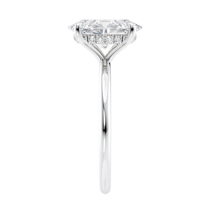Oval solitaire diamond engagement ring with a hidden halo in white gold end view.
