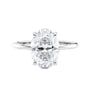 Oval solitaire diamond engagement ring with a hidden halo in white gold front view.