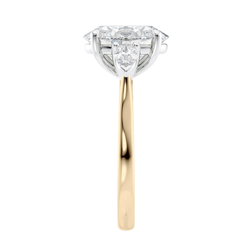 Oval Lab grown diamond three stone engagement ring with pear cut accent stones 18ct gold end view.