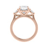 Oval Lab grown diamond three stone engagement ring with pear cut accent stones 18ct rose gold side view.