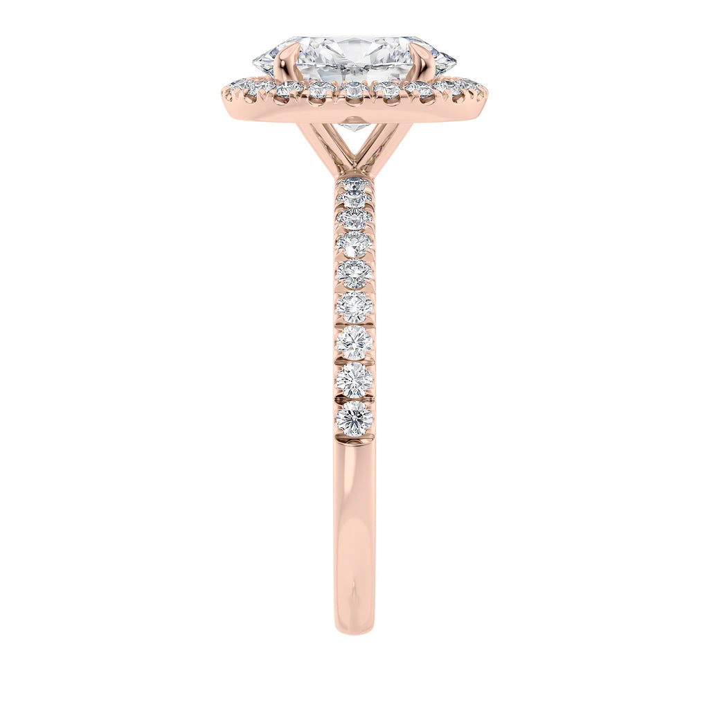 18 carat rose gold oval halo engagement ring end view.