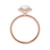 18 carat rose gold oval halo engagement ring side view.