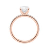 Laboratory grown diamond oval solitaire engagement ring with slim diamond band 18ct rose gold side view.