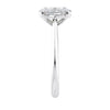 Natural oval hidden diamond bridge engagement ring with white gold band end view.