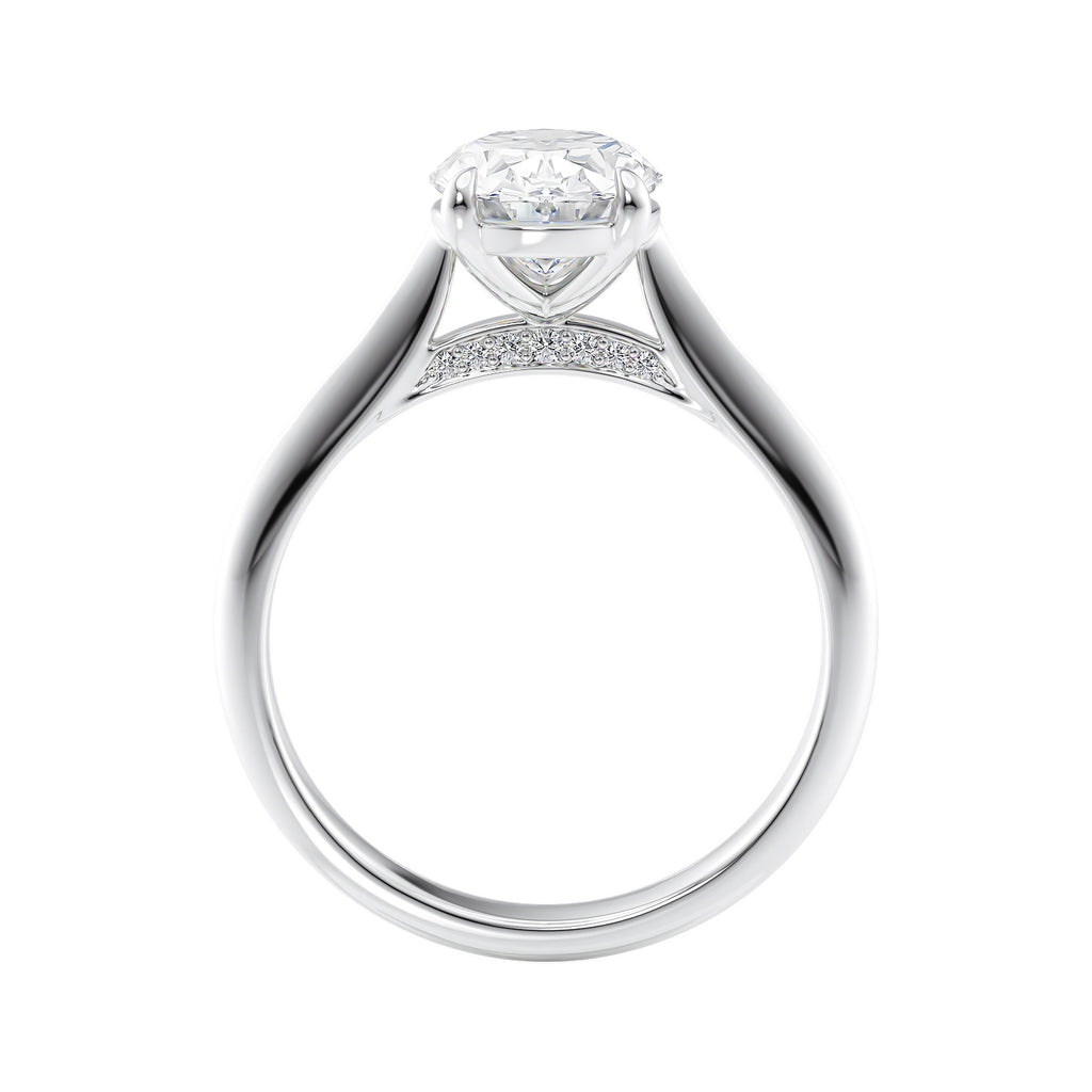 Natural oval hidden diamond bridge engagement ring with white gold band side view.