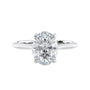 Natural oval hidden diamond bridge engagement ring with white gold band front view.