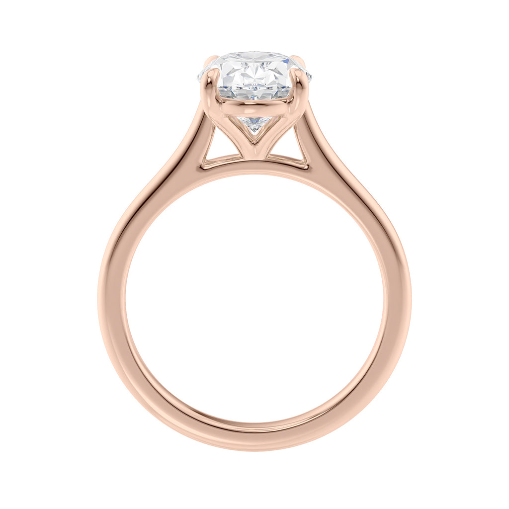 Oval solitaire with ultra slim rose gold band side view.