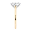 Oval solitaire with ultra slim gold band end view.