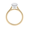 Oval solitaire with ultra slim gold band side view.