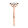 Oval solitaire with ultra slim rose gold band end view.