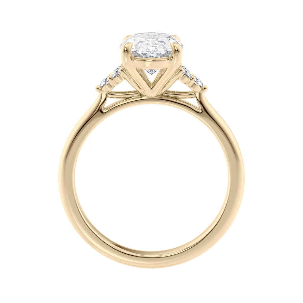 Oval diamond engagement ring with six accent shoulder diamonds 18ct gold side view.