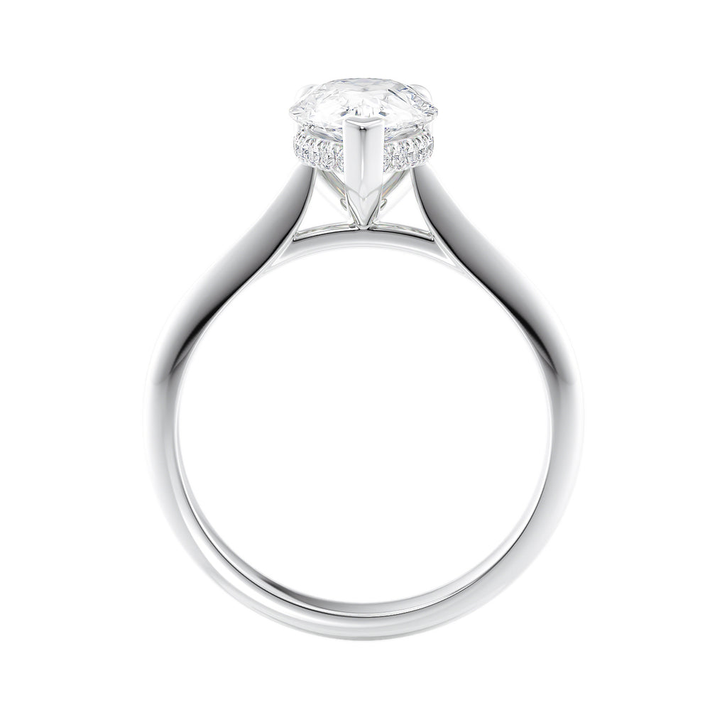 Natural pear cut diamond engagement ring with a hidden halo and white gold band side view.
