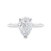 Natural pear cut diamond engagement ring with a hidden halo and white gold band front view.