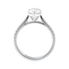 Pear cut lab grown diamond engagement ring with tapered diamond band white gold side view.