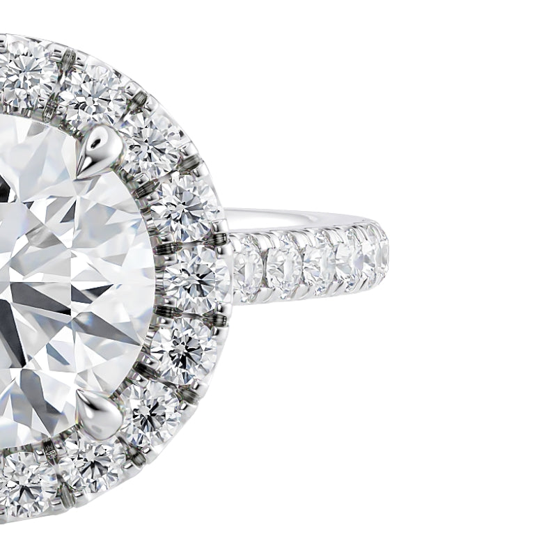 Halo diamond engagement ring platinum by mcguire diamonds. Available in gold, white gold and platinum. 