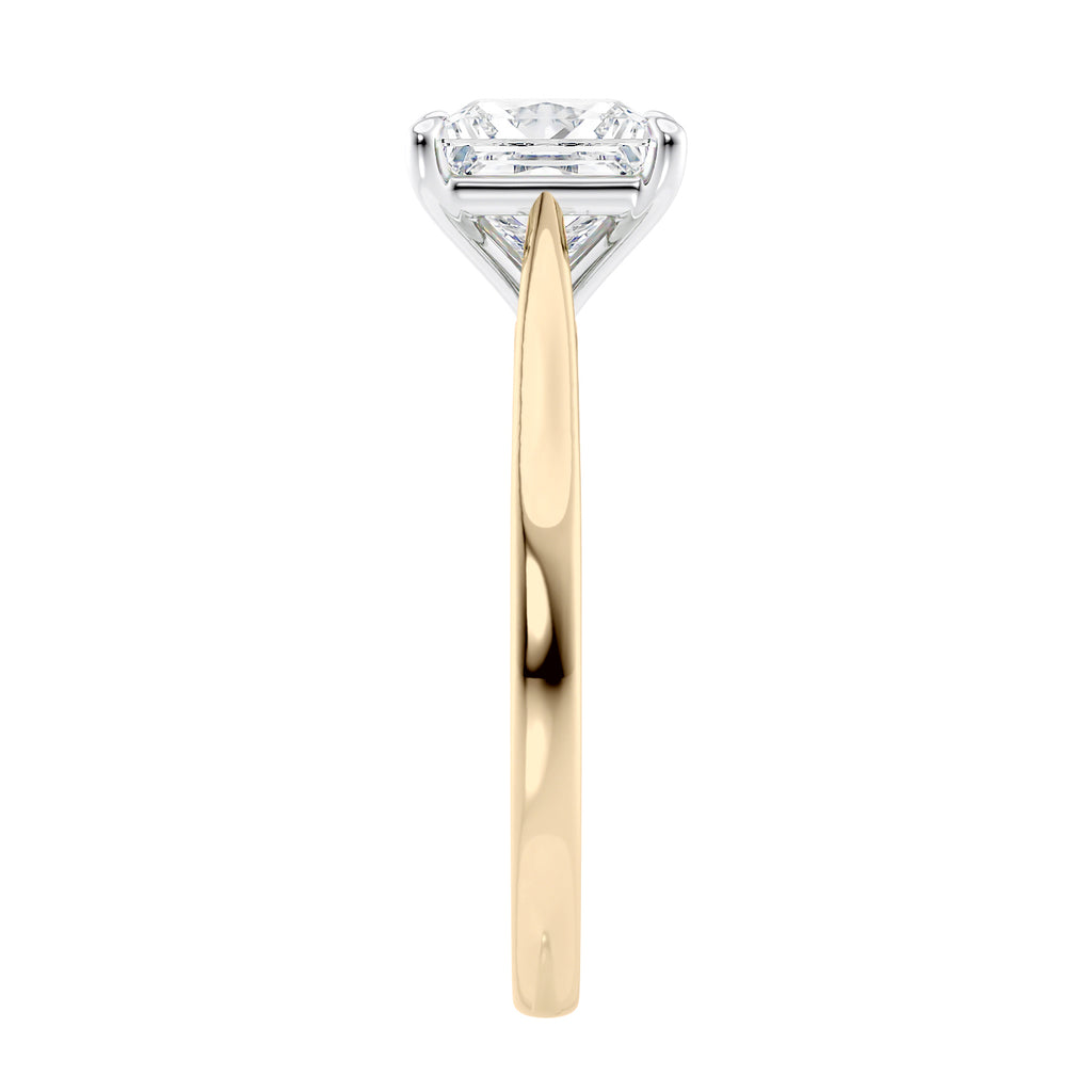 Princess cut solitaire diamond engagement ring with gold band end view.