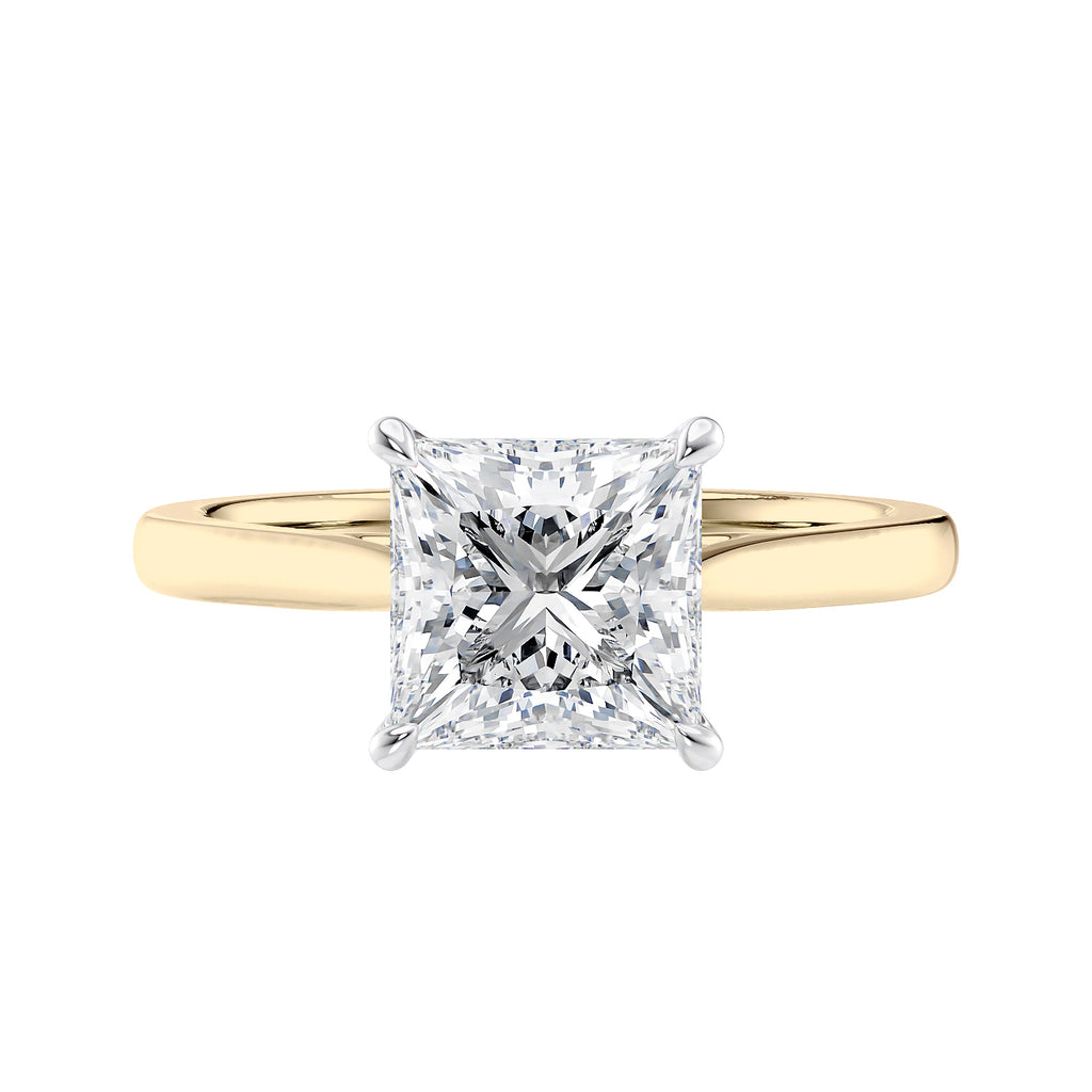 Princess cut solitaire diamond engagement ring with gold band front view.