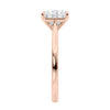 Princess cut solitaire diamond engagement ring with rose gold band end view.