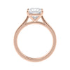 Princess cut solitaire diamond engagement ring with rose gold band side view.