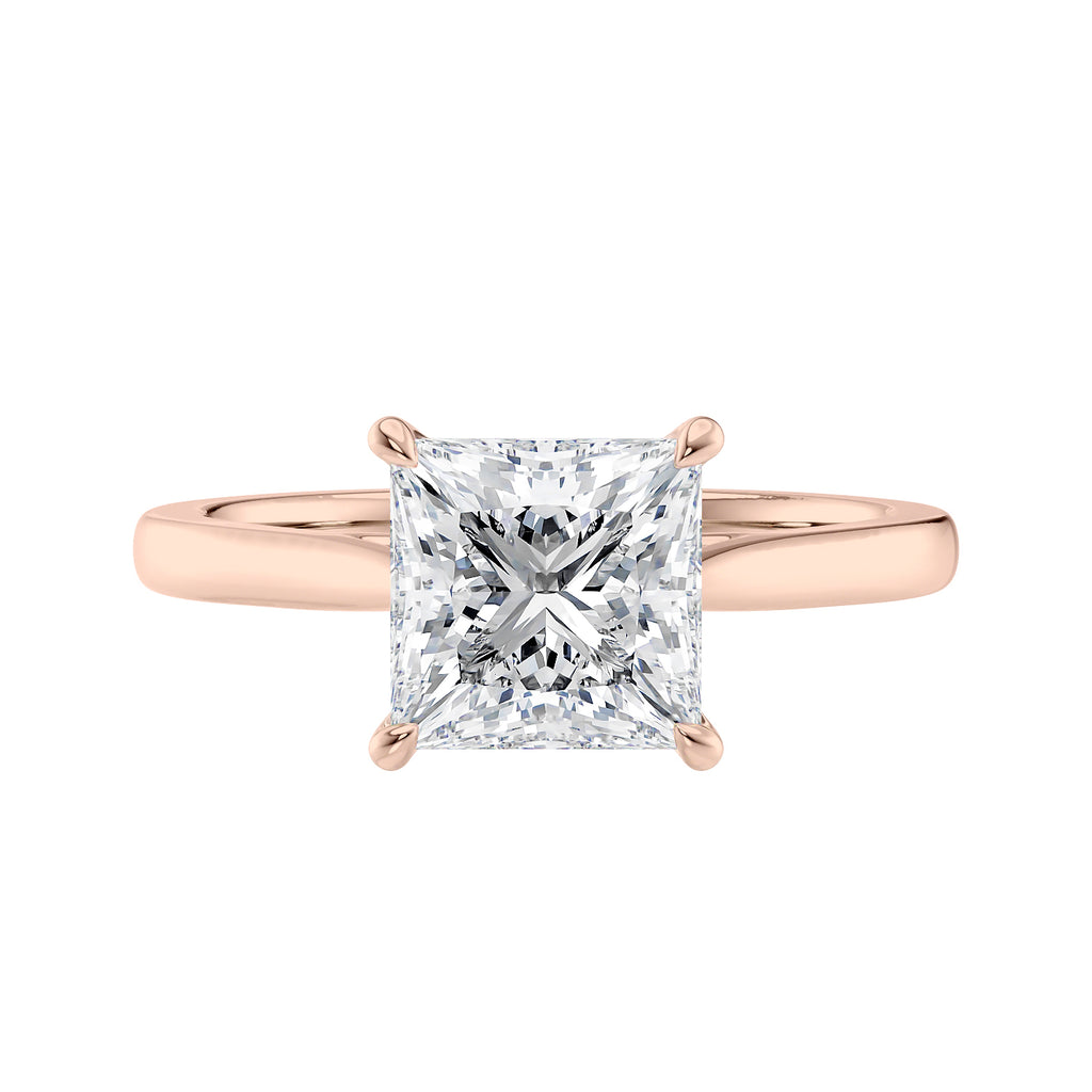 Princess cut solitaire diamond engagement ring with rose gold band front view.