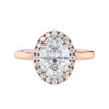 Oval halo diamond engagement ring in rose gold front view.