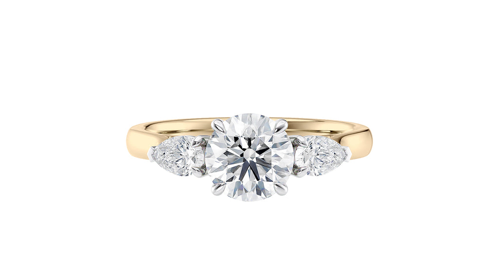 Round and Pear Cut Trilogy Diamond Engagement Ring
