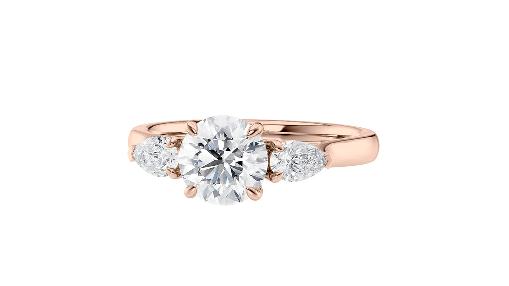 Round and Pear Cut Trilogy Diamond Engagement Ring
