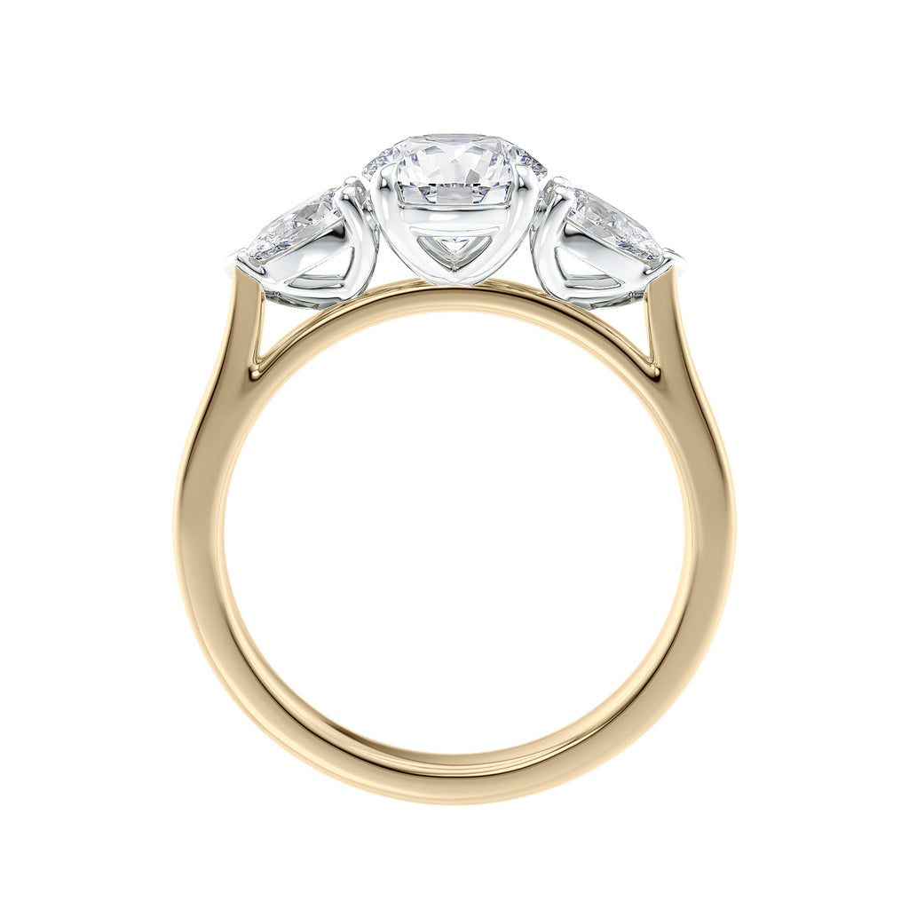 Round cut with pear sides trilogy lab grown diamond engagement ring gold side view.