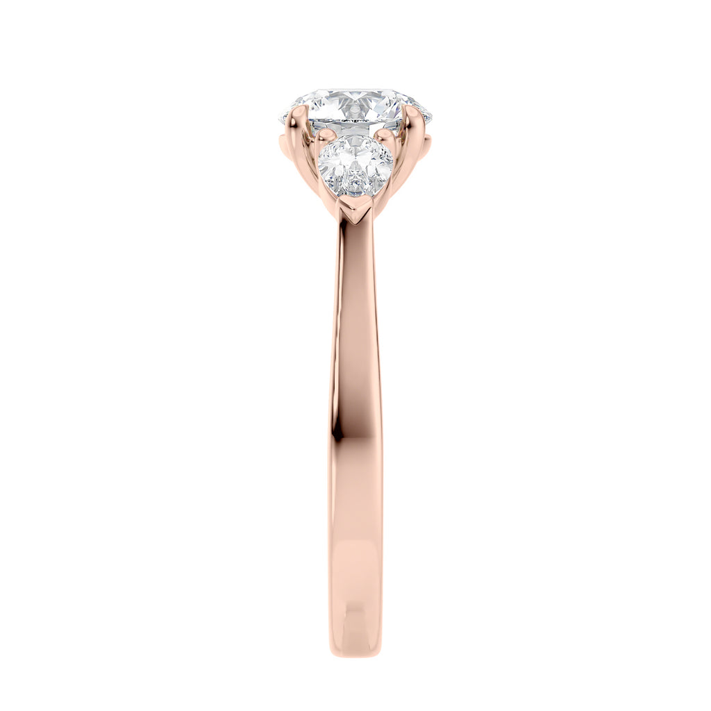Round cut with pear sides trilogy lab grown diamond engagement ring rose gold end view.