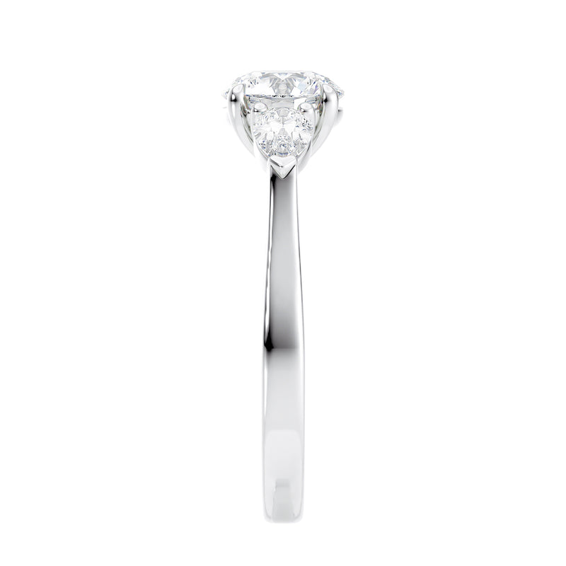 Round cut with pear sides trilogy lab grown diamond engagement ring white gold end view.
