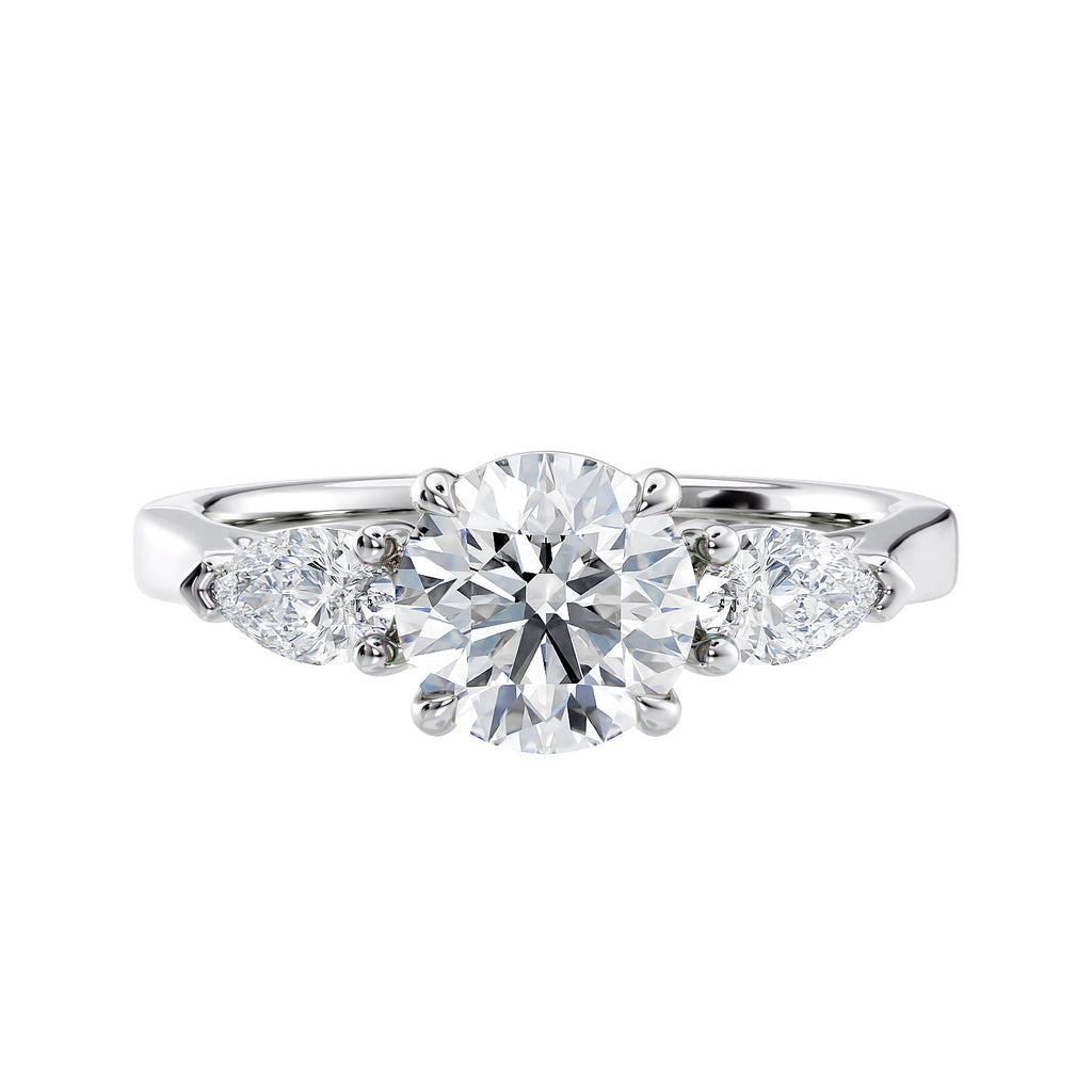 Round cut with pear sides trilogy lab grown diamond engagement ring white gold front view.
