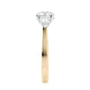 Round and pear three stone natural diamond engagement ring in 18ct yellow gold end view.