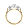 Round and pear three stone natural diamond engagement ring in 18ct yellow gold side view.