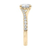 Brilliant cut diamond engagement ring with diamond set twist style band 18ct gold end view.