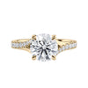 Brilliant cut diamond engagement ring with diamond set twist style band 18ct gold front view.