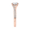 Brilliant cut diamond engagement ring with diamond set twist style band rose gold end view.