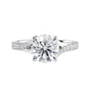 Brilliant cut diamond engagement ring with diamond set twist style band white gold front view.
