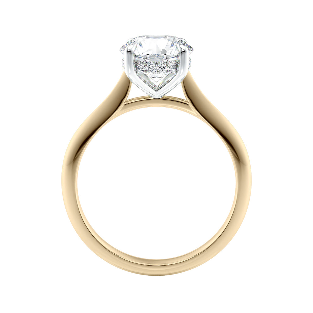 Two carat lab grown diamond solitaire with hidden halo gold band side view.