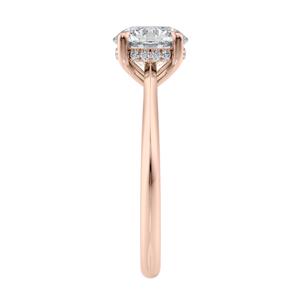 Two carat lab grown diamond solitaire with hidden halo rose gold band end view.