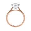 Six claw natural diamond classic engagement ring rose gold side view.