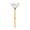 Laboratory grown oval diamond engagement ring gold slim band end view.