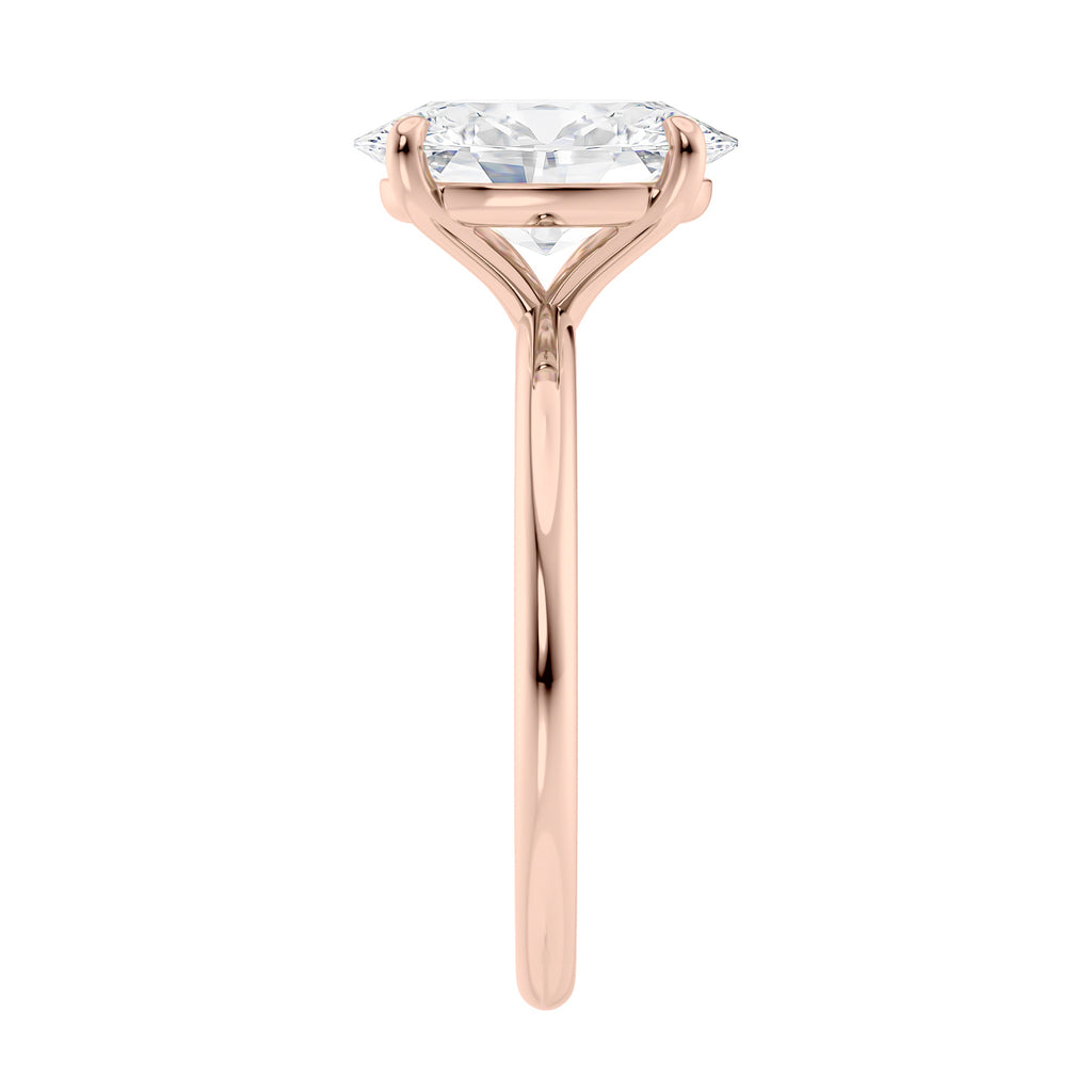 Laboratory grown oval diamond engagement ring rose gold slim band end view.