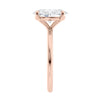 Laboratory grown oval diamond engagement ring rose gold slim band end view.