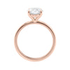 Laboratory grown oval diamond engagement ring rose gold slim band side view.