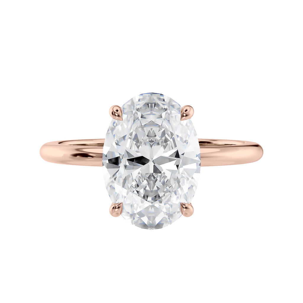 Laboratory grown oval diamond engagement ring rose gold slim band front view.